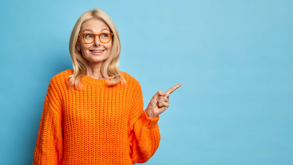 thoughtful-blonde-forty-years-old-european-woman-wears-spectacles-knitted-orange-sweater-pointing-copy-space-1024x576 Dieta seniora – jak spowolnić procesy starzenia się organizmu? 